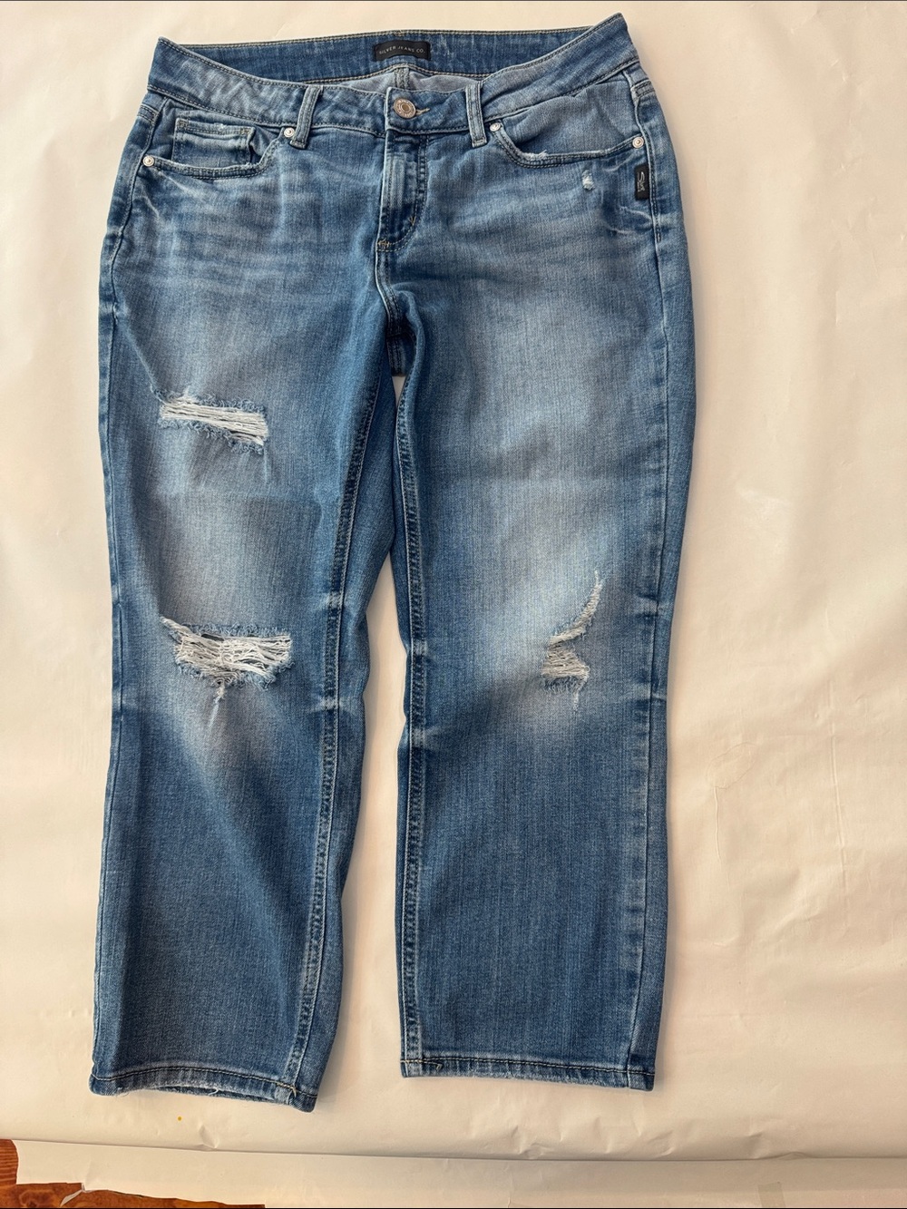 Women’s Distressed Silver Capri Jeans